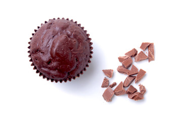 Delicious homemade cupcake with raisins and chocolate isolated on white background. Muffins. Top view.