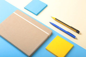 Notebook, pen, pencil and other supplies for business office. Copy space. Top view.