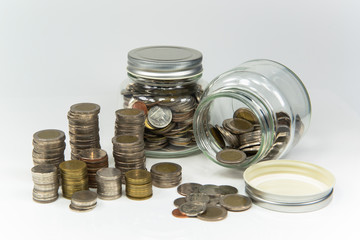 Saving money in a jar clear for the future.