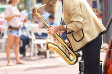 Street musicians play jazz on the town square
