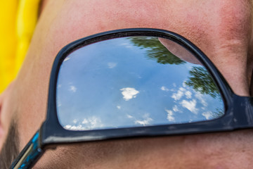 close glasses on face with skin texture