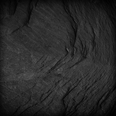 Dark grey black slate background or texture.