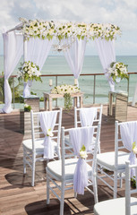 Beautiful boho wedding set up, flower decoration, tropical style