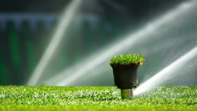 Soccer or football field irrigation system of automatic watering grass.