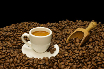 Hot coffee espresso with coffee beans
