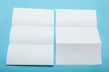 Empty tri fold menu mockup, white paper folder.