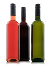 Group of blank wine bottles with white red and rose wines isolated on white background for individual designs and graphics