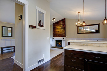 Beautiful bright home interior with vaulted ceiling.