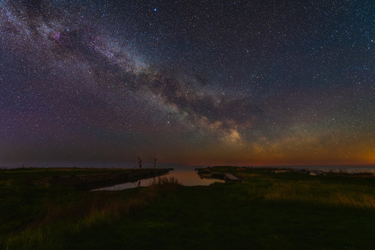 The Milky Way over the harbour in Sk&auml;rl&ouml;v