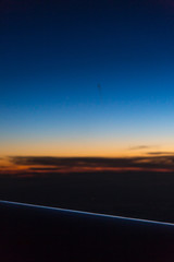 Fototapeta na wymiar Sunrise from a airplane