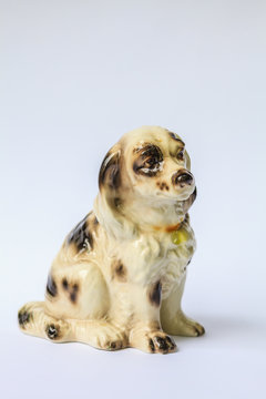 Decorative antique porcelain dog isolated on white