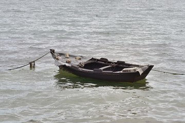 wooden fishing boat moored