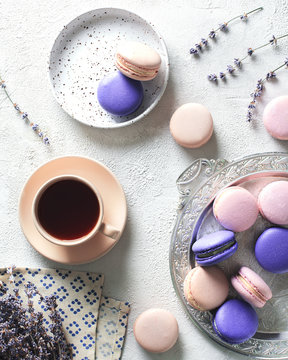 Spaing mood with color macaroons? cup of coffee and flowers