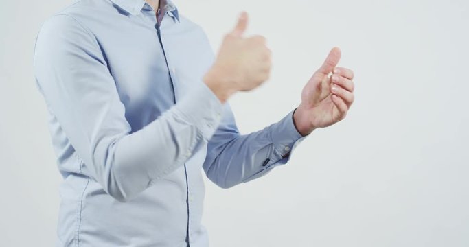 Man punching his fist into his hand