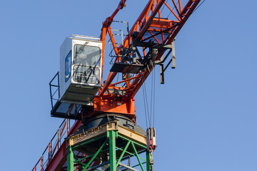 CRANE - A high construction machine on a construction site
