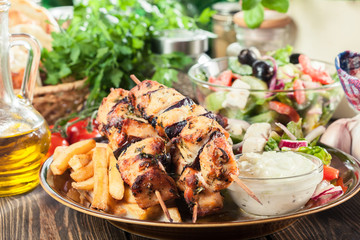 Chicken Souvlaki with french fries and tzatziki sauce