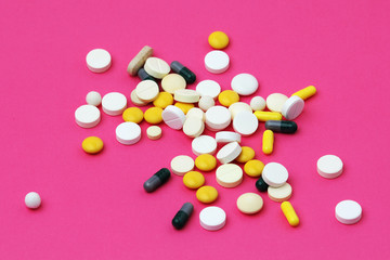 Medicines different forms and colors at bright background