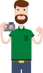 An angry bearded man in a green T-shirt is holding a camera and showing a dislike