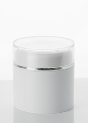 cosmetic cream in container isolated on white background