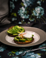 poached egg, avocado on wholemeal round bread