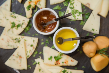 Traditional italian aperitif with proscioutto, mortadella sausage, cheese and aperol spritz drink