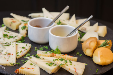 Traditional italian aperitif with proscioutto, mortadella sausage, cheese and aperol spritz drink
