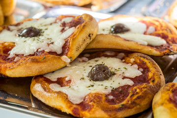Sicilian "Cartocciata", a typical street food from Sicily. Made with ham, tomato and cheese.