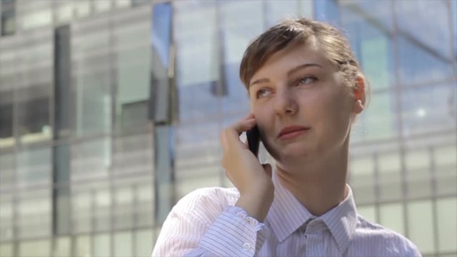 Energetic Woman Talking by Phone