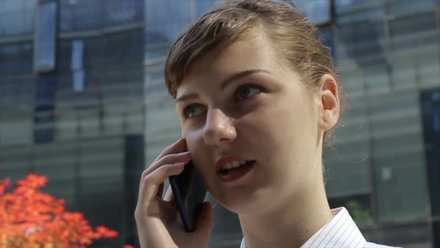 Happy Woman talking about her success. 