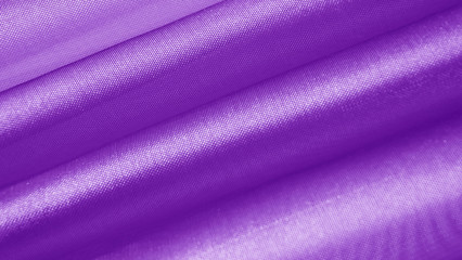 Fototapeta na wymiar Beautiful purple background made of light fabric.Abstract background.