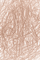 Dry straws on the ground. Real natural texture outdoors. Grass background.