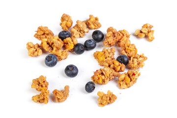 Granola with dried fruits isolated on white