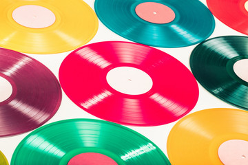 Retro color turntable vinyl discs for background. Vintage old style filtered photo