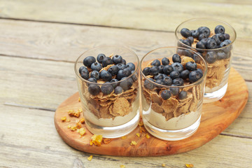 Granola, yogurt and strawberries in a jars