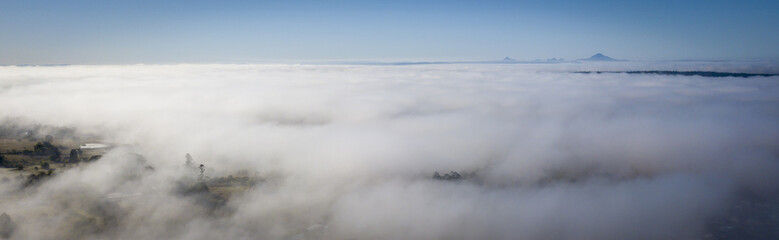 Aerial drone view of a foggy morning in the Scenic Rim, Queensland, Australia