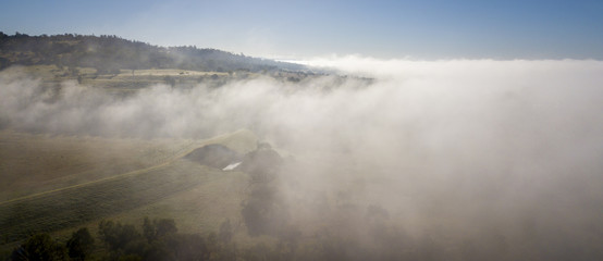 Aerial drone view of a foggy morning in the Scenic Rim, Queensland, Australia