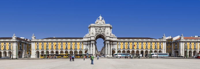 Lisbon, Portugal - April 14, 2013: Praca do Comercio aka Terreirro do Paco Square with the famous Triumphal Arch of Rua Augusta Street. Baixa District