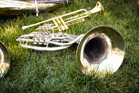Several musical wind instruments of a trumpet orchestra.