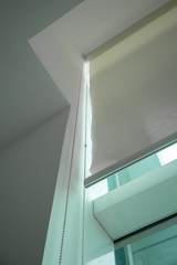 White curtain rail system with light curtain installed on ceiling