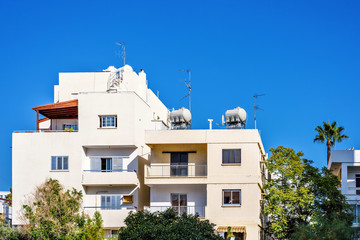 Fototapeta na wymiar Daylight view to apartment buildings with balconies