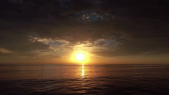 Sunset time lapse over the ocean 4K
