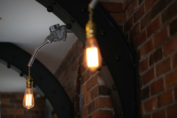 Vintage light on brick wall