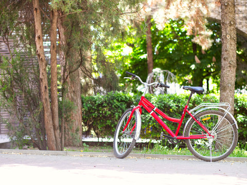 red bike standing on the street