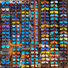 Outdoor showcase with a variety of sunglasses for eye protection.