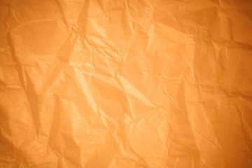 Brown crumpled paper background.