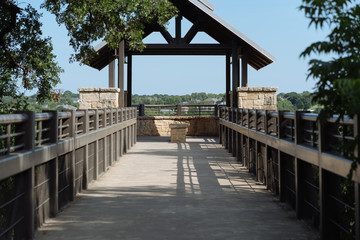 The path to the observation tower in the city park on a sunny spring day in Texas