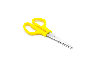 yellow plastic scissors isolated on white background