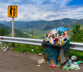 Dumpsters being full with garbage