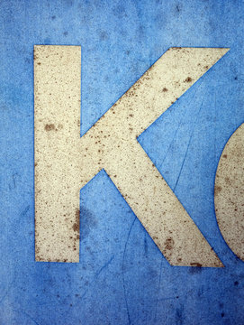 Written Wording in Distressed State Typography Found Letter K
