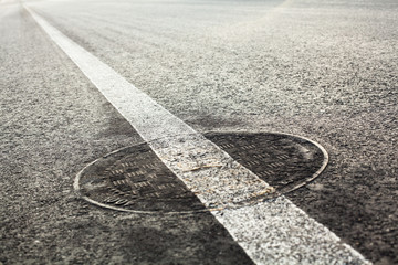 Manhole cover on the road